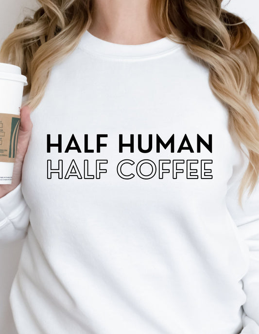 Half human half coffee sweatshirt. Great gift for coffee lovers. Trendy, fun, and minimalistic styles. Ideal for any situation. Perfect for everyday wear and comfort. 50% cotton, 50% polyester. Medium-heavy fabric. Unisex sizing.